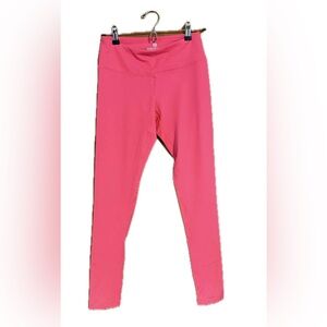 Pink athletic pants, ankle cut